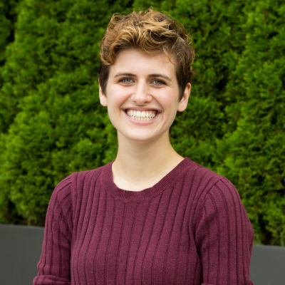 Headshot photo of Maddie Smith smiling at the camera